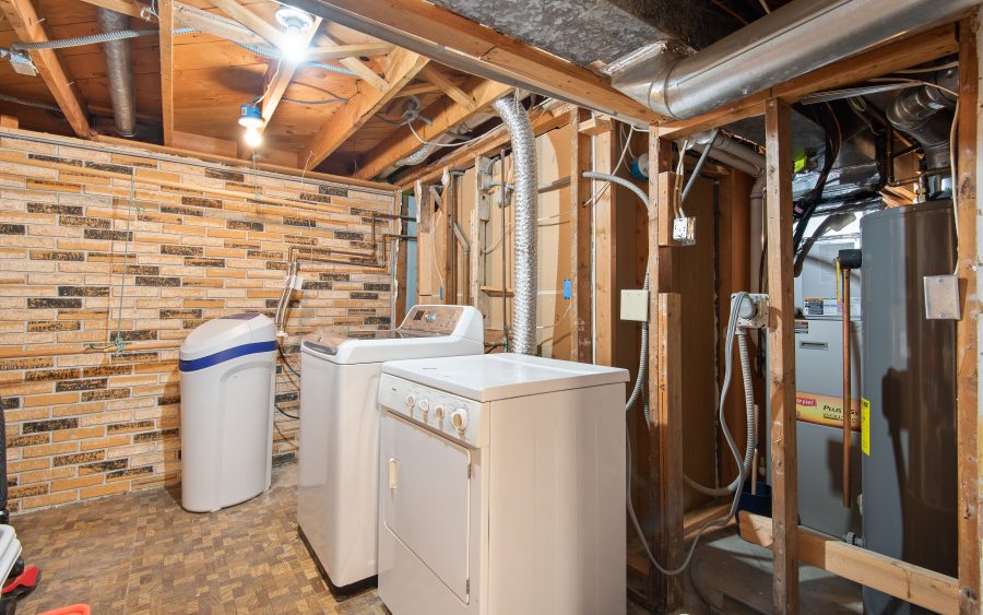 Water heater and pump fitting