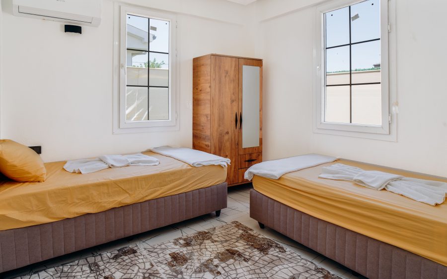 Twin room with a place to dry kit